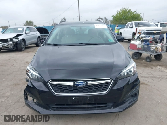 2019 Subaru Impreza Premium z VIN 4S3GTAC63K3754877, wystawiony jako IAAI lot #42174843 z przebiegiem 66 184 mil mil oraz . Historia ofert i sprzedaży dostępna na DreamBid. Obrazek 12.