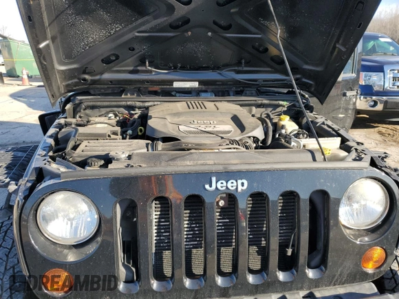2013 Jeep Wrangler Sport with VIN 1C4AJWAG2DL699264, listed as a Copart auction lot 46889475 with 109,485 mi miles and Salvage Title. Bid and sale history available at carsss.com. Image 11.