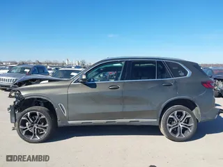 2021 BMW X5 xDrive40i with VIN 5UXCR6C09M9G00150, listed as a IAAI auction lot 41647528 with 1 mi miles. Bid and sale history available at carsss.com. Image 14.