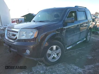 2009 Honda Pilot EX-L with VIN 5FNYF48649B026889, listed as a IAAI auction lot 41643289 with 121,511 mi miles and . Bid and sale history available at carsss.com. Image 17.