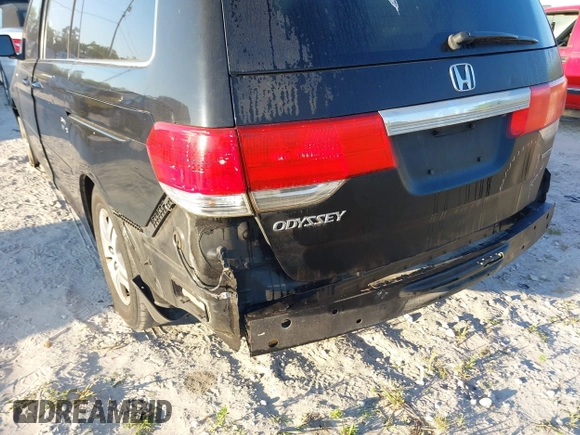 2010 Honda Odyssey Touring with VIN 5FNRL3H95AB031007, listed as a IAAI auction lot 41852435 with 207,919 mi miles. Bid and sale history available at carsss.com. Image 13.