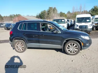 2016 Volkswagen Tiguan S z VIN WVGBV7AX9GW615535, wystawiony jako IAAI lot #41773789 z przebiegiem 137 617 mil mil oraz . Historia ofert i sprzedaży dostępna na DreamBid. Obrazek 13.