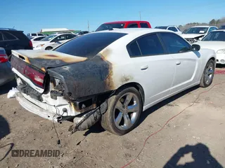 2014 Dodge Charger SXT with VIN 2C3CDXHG8EH117439, listed as a IAAI auction lot 41458304 with 189,041 mi miles and . Bid and sale history available at DreamBid. Image 4.