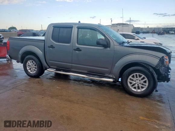 2016 Nissan Frontier SV with VIN 1N6AD0ER7GN766060, listed as a Copart auction lot 54343535 with 121,820 mi miles and Salvage title. Bid and sale history available at DreamBid. Image 4.