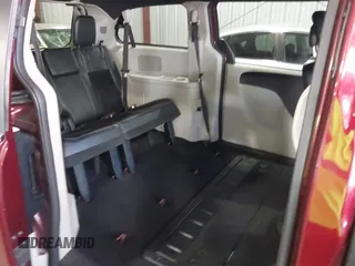 2018 Dodge Grand Caravan SXT with VIN 2C4RDGCG4JR297603, listed as a IAAI auction lot 42144645 with 114,098 mi miles and . Bid and sale history available at DreamBid. Image 8.