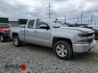 2018 Chevrolet Silverado 1500 LT with VIN 1GCVKREH4JZ118570, listed as a Copart auction lot 53143175 with 105,685 mi miles and Salvage Title. Bid and sale history available at DreamBid. Image 4.
