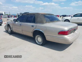 1997 Mercury Grand Marquis LS with VIN 2MELM75W3VX707138, listed as a IAAI auction lot 40055743 with 198,489 mi miles and . Bid and sale history available at DreamBid. Image 3.