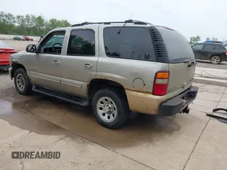 2001 Chevrolet Tahoe LT z VIN 1GNEK13T01R128643, wystawiony jako IAAI lot #42286231 z przebiegiem 186 852 mil mil oraz . Historia ofert i sprzedaży dostępna na DreamBid. Obrazek 3.