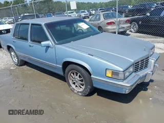 1992 Cadillac DeVille z VIN 1G6CD53B0N4286396, wystawiony jako IAAI lot #42278473 z przebiegiem 94 186 mil mil oraz . Historia ofert i sprzedaży dostępna na DreamBid. Obrazek 1.