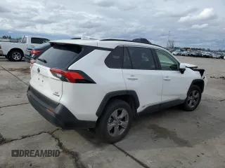 2023 Toyota RAV4 Hybrid LE with VIN JTMMWRFV3PD570648, listed as a Copart auction lot 86983174 with 27,258 mi miles and Salvage title. Bid and sale history available at DreamBid. Image 3.