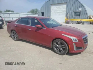 2014 Cadillac CTS Vsport RWD z VIN 1G6AU5S85E0160488, wystawiony jako Copart lot #53439575 z przebiegiem 146 309 mil mil oraz Szkoda całkowita • Salvage title. Historia ofert i sprzedaży dostępna na DreamBid. Obrazek 4.