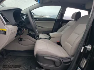 2018 Hyundai Tucson SE with VIN KM8J23A45JU698516, listed as a Copart auction lot 49079215 with 57,609 mi miles and Salvage Title. Bid and sale history available at carsss.com. Image 7.