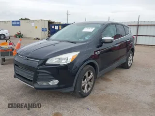 2015 Ford Escape SE with VIN 1FMCU9G90FUA54163, listed as a IAAI auction lot 42058788 with 130,623 mi miles. Bid and sale history available at carsss.com. Image 2.