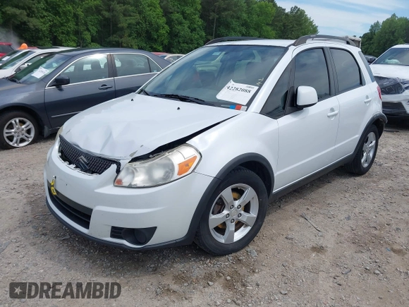 2012 Suzuki SX4 Crossover z VIN JS2YB5A35C6304967, wystawiony jako IAAI lot #42282088 z przebiegiem 152 232 mil mil oraz . Historia ofert i sprzedaży dostępna na DreamBid. Obrazek 19.