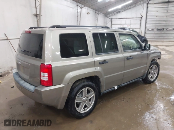 2008 Jeep Patriot Sport with VIN 1J8FT28WX8D549644, listed as a IAAI auction lot 41919125 with 125,859 mi miles. Bid and sale history available at carsss.com. Image 4.