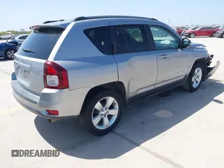 2017 Jeep Compass Sport with VIN 1C4NJCBA5HD147977, listed as a IAAI auction lot 41821444 with 86,126 mi miles and . Bid and sale history available at carsss.com. Image 4.