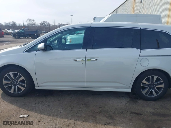 2015 Honda Odyssey Touring Elite with VIN 5FNRL5H9XFB121921, listed as a IAAI auction lot 41858551 with 61,506 mi miles. Bid and sale history available at carsss.com. Image 14.