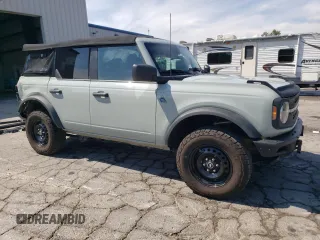 2021 Ford Bronco with VIN 1FMEE5BP4MLA94558, listed as a Copart auction lot 68940904 with 59,409 mi miles and Salvage title. Bid and sale history available at DreamBid. Image 4.
