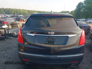 2019 Cadillac XT5 Luxury FWD z VIN 1GYKNCRS2KZ251207, wystawiony jako IAAI lot #42066271 z przebiegiem 128 226 mil mil oraz . Historia ofert i sprzedaży dostępna na DreamBid. Obrazek 16.