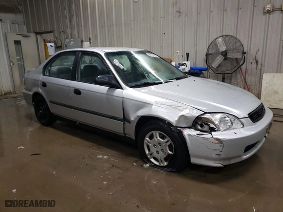 1997 Honda Civic DX with VIN 1HGEJ6624VL021651, listed as a Copart auction lot 86190384 with 135,159 mi miles and Salvage Title. Bid and sale history available at carsss.com. Image 4.