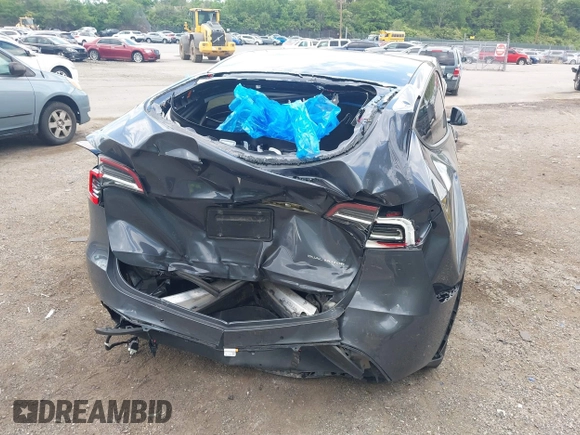 2021 Tesla Model Y Long Range z VIN 5YJYGDEE6MF070068, wystawiony jako IAAI lot #42224634 z przebiegiem 33 850 mil mil oraz . Historia ofert i sprzedaży dostępna na DreamBid. Obrazek 6.