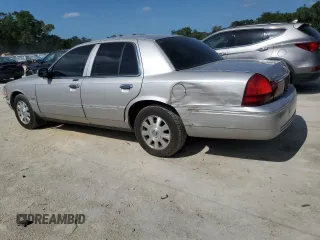2003 Mercury Grand Marquis LS Premium with VIN 2MEHM75W63X697725, listed as a Copart auction lot 54485505 with 129,194 mi miles and Salvage Title. Bid and sale history available at DreamBid. Image 2.