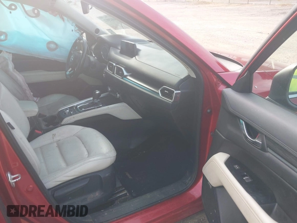 2017 Mazda CX-5 Grand Touring with VIN JM3KFADL8H0189033, listed as a IAAI auction lot 40029931 with 88,933 mi miles and . Bid and sale history available at carsss.com. Image 5.