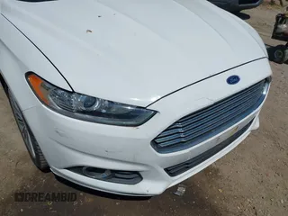 2013 Ford Fusion SE Hybrid with VIN 3FA6P0LU4DR337674, listed as a IAAI auction lot 42164262 with 150,902 mi miles and . Bid and sale history available at carsss.com. Image 13.