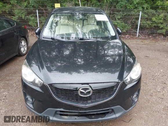 2013 Mazda CX-5 Sport with VIN JM3KE2BE8D0125002, listed as a IAAI auction lot 42425404 with 183,551 mi miles and . Bid and sale history available at DreamBid. Image 6.