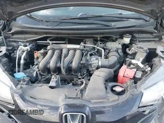 2015 Honda Fit LX with VIN 3HGGK5H5XFM719477, listed as a IAAI auction lot 41671194 with 145,876 mi miles. Bid and sale history available at carsss.com. Image 10.