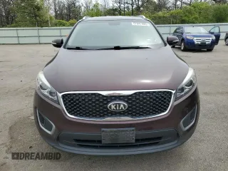 2016 Kia Sorento LX z VIN 5XYPG4A39GG061412, wystawiony jako Copart lot #57947885 z przebiegiem 134 381 mil mil oraz Szkoda całkowita • Salvage title. Historia ofert i sprzedaży dostępna na DreamBid. Obrazek 5.