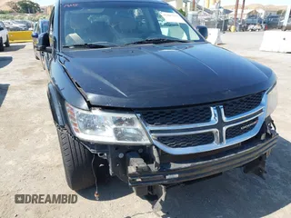 2012 Dodge Journey SXT with VIN 3C4PDDBG0CT300469, listed as a IAAI auction lot 42467233 with 127,420 mi miles and . Bid and sale history available at DreamBid. Image 6.
