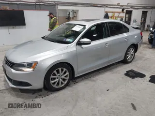 2014 Volkswagen Jetta Sedan SE w/Connectivity/Sunroof PZEV with VIN 3VWD17AJ9EM437804, listed as a IAAI auction lot 42026842 with 83,114 mi miles. Bid and sale history available at carsss.com. Image 17.