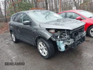 2017 Ford Escape SE z VIN 1FMCU9GD2HUF00790, wystawiony jako IAAI lot #41868811 z przebiegiem 57 886 mil mil oraz . Historia ofert i sprzedaży dostępna na DreamBid. Obrazek 1.