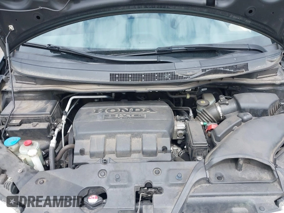2012 Honda Odyssey Touring with VIN 5FNRL5H93CB121190, listed as a IAAI auction lot 42223998 with 154,358 mi miles and . Bid and sale history available at DreamBid. Image 10.
