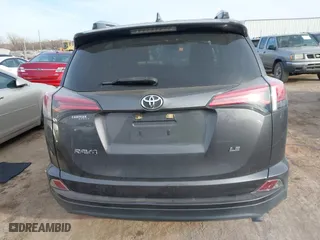 2018 Toyota RAV4 LE with VIN JTMZFREV4JJ183106, listed as a IAAI auction lot 41449468 with 114,719 mi miles. Bid and sale history available at carsss.com. Image 16.