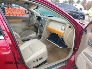2009 Lincoln MKZ z VIN 3LNHM28T09R633561, wystawiony jako IAAI lot #40751995 z przebiegiem 161 001 mil mil oraz . Historia ofert i sprzedaży dostępna na DreamBid. Obrazek 5.