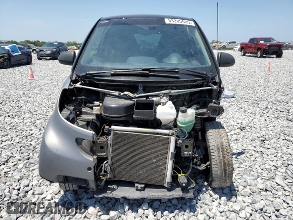 2015 Smart fortwo Passion z VIN WMEEJ3BA5FK819174, wystawiony jako Copart lot #53205005 z przebiegiem 78 364 mil mil oraz Szkody całkowita. Historia ofert i sprzedaży dostępna na DreamBid. Obrazek 5.