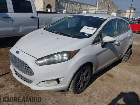 2016 Ford Fiesta SE z VIN 3FADP4EJ5GM136658, wystawiony jako IAAI lot #41312966 z przebiegiem 145 561 mil mil oraz . Historia ofert i sprzedaży dostępna na DreamBid. Obrazek 2.
