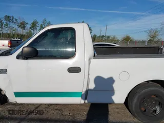 2002 Ford F-150 XL z VIN 1FTRF17L22NB18648, wystawiony jako IAAI lot #41843041 z przebiegiem 90 033 mil mil oraz . Historia ofert i sprzedaży dostępna na DreamBid. Obrazek 15.