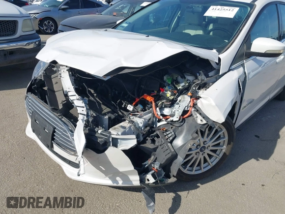 2013 Ford Focus Electric z VIN 1FADP3R42DL196988, wystawiony jako IAAI lot #41632025 z przebiegiem 72 578 mil mil oraz . Historia ofert i sprzedaży dostępna na DreamBid. Obrazek 6.
