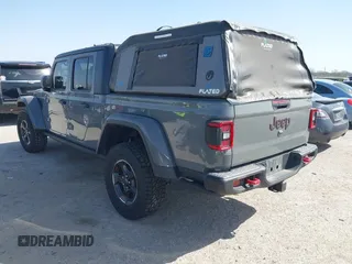 2022 Jeep Gladiator Rubicon z VIN 1C6JJTBG2NL167034, wystawiony jako IAAI lot #41854225 z przebiegiem Nie podano mil oraz . Historia ofert i sprzedaży dostępna na DreamBid. Obrazek 3.