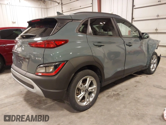 2022 Hyundai Kona SEL with VIN KM8K6CAB3NU890448, listed as a IAAI auction lot 41879210 with 74,438 mi miles and . Bid and sale history available at DreamBid. Image 4.