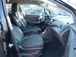 2021 Chevrolet Trax LT with VIN KL7CJPSB9MB342992, listed as a IAAI auction lot 41667044 with 52,289 mi miles. Bid and sale history available at carsss.com. Image 5.