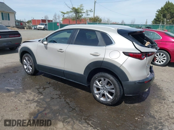 2022 Mazda CX-30 S Select with VIN 3MVDMBBL4NM401563, listed as a IAAI auction lot 41826878 with 4,733 mi miles and . Bid and sale history available at carsss.com. Image 3.