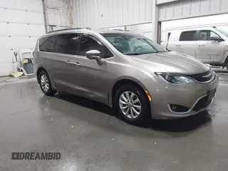 2018 Chrysler Pacifica Touring Plus z VIN 2C4RC1FG1JR278437, wystawiony jako IAAI lot #41911660 z przebiegiem 125 381 mil mil oraz . Historia ofert i sprzedaży dostępna na DreamBid. Obrazek 1.