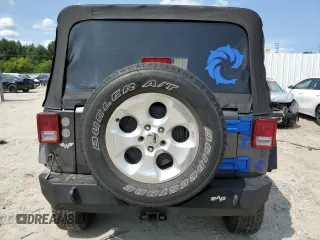 2018 Jeep Wrangler JK Unlimited Sport S with VIN 1C4BJWDG3JL899209, listed as a Copart auction lot 67705634 with 100,679 mi miles and Salvage Title. Bid and sale history available at carsss.com. Image 6.