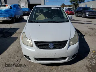 2011 Suzuki SX4 LE with VIN JS2YC5A22B6301740, listed as a Copart auction lot 75802264 with 112,171 mi miles and Salvage Title. Bid and sale history available at carsss.com. Image 5.