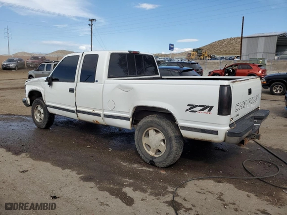 1999 Chevrolet C/K 1500 with VIN 1GCEK19RXXR111474, listed as a Copart auction lot 71250254 with 216,539 mi miles and Salvage Title. Bid and sale history available at carsss.com. Image 2.