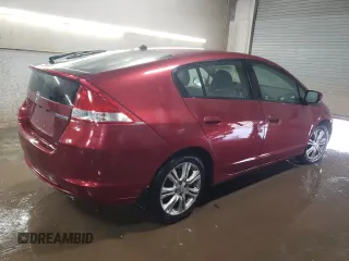 2010 Honda Insight LX with VIN JHMZE2H52AS034613, listed as a Copart auction lot 52701795 with 232,541 mi miles and Salvage Title. Bid and sale history available at DreamBid. Image 3.